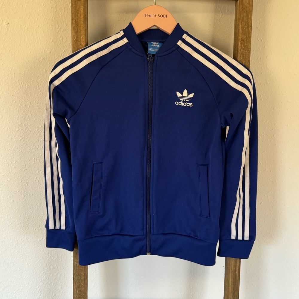 Adidas 
Tracksuit active jacket
Size small 9-10
Like new condition 
Unisex
